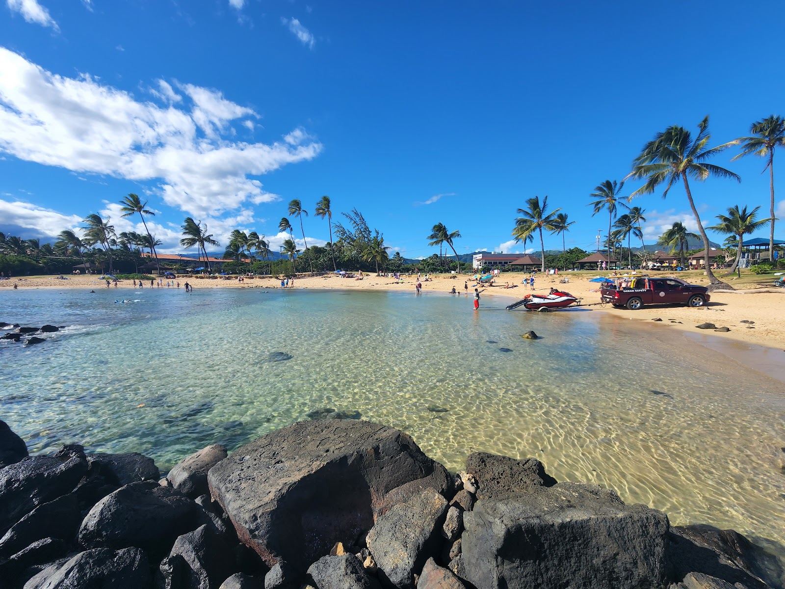 The calmer south shore water at Poipu Beach on Kauai