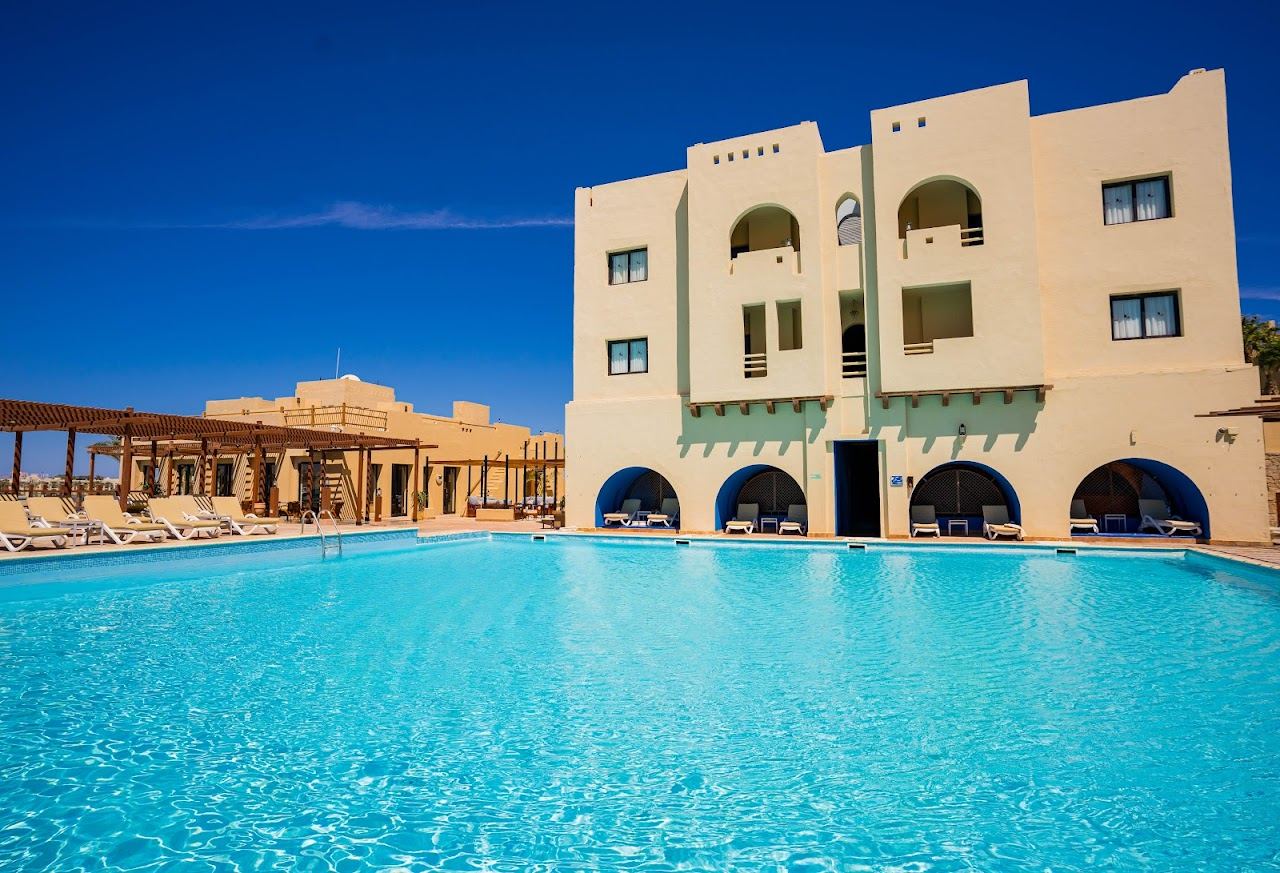 The marina frontage, resort beach and calm water of the Marina Lodge at Port Ghalib near Marsa Alam