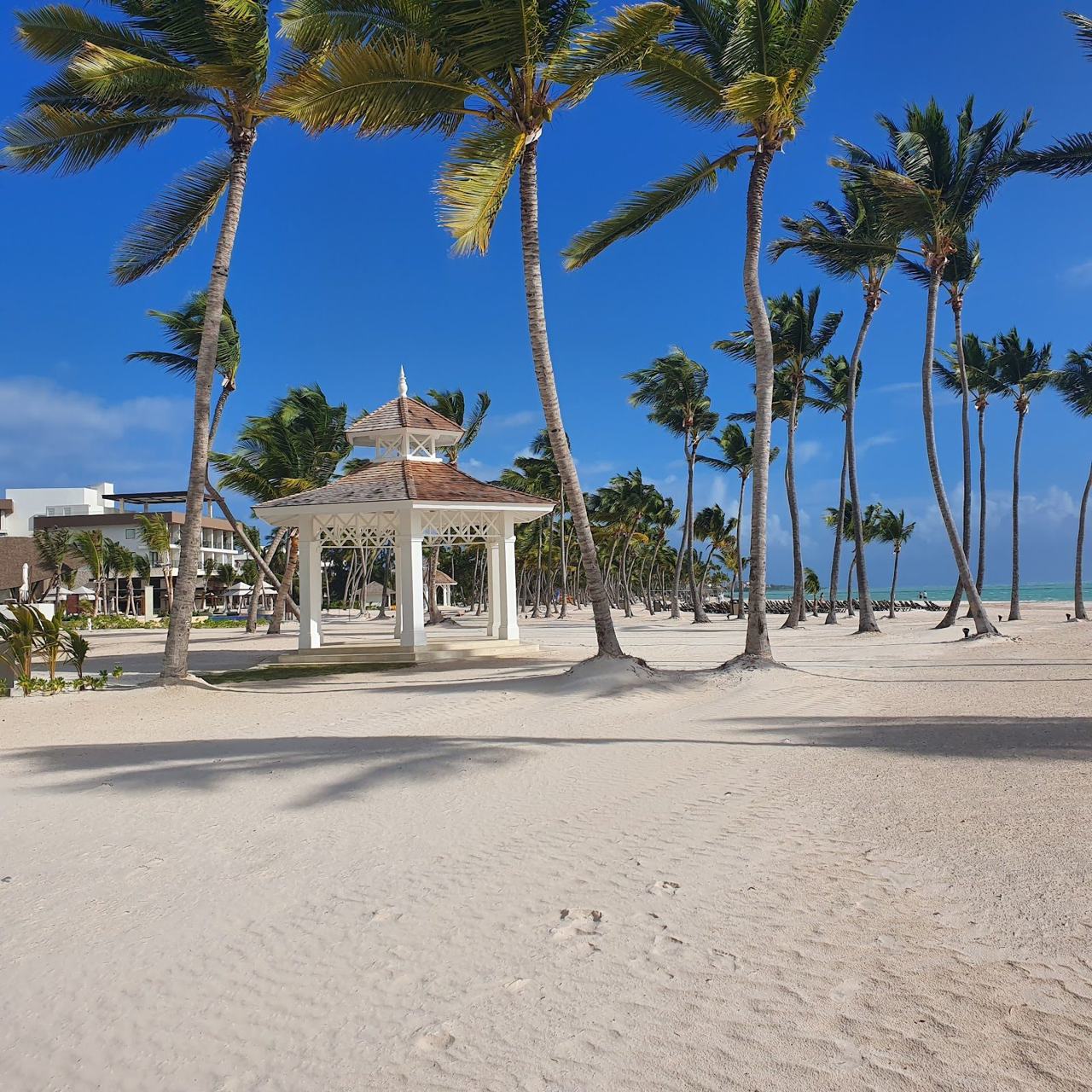 Calm clear turquoise water and soft sand at Juanillo beach in Cap Cana Punta Cana in the Dominican Republic