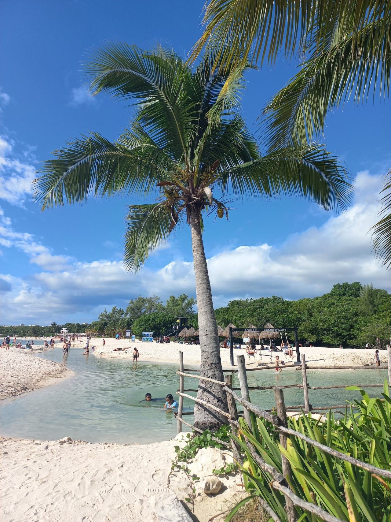 The open coastal cenote meeting the Caribbean at Punta Esmeralda beach