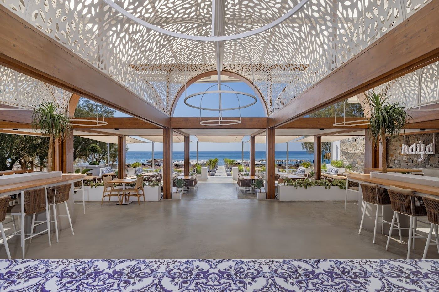 Sunbeds and umbrellas at a beach club on the Kallithea coast in Rhodes