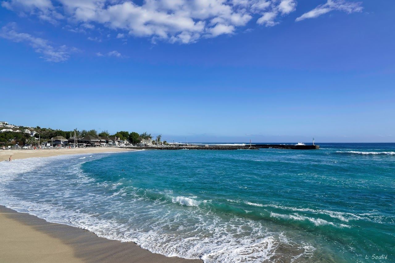 The Saint Gilles les Bains seafront and marina behind Roches Noires beach in Reunion