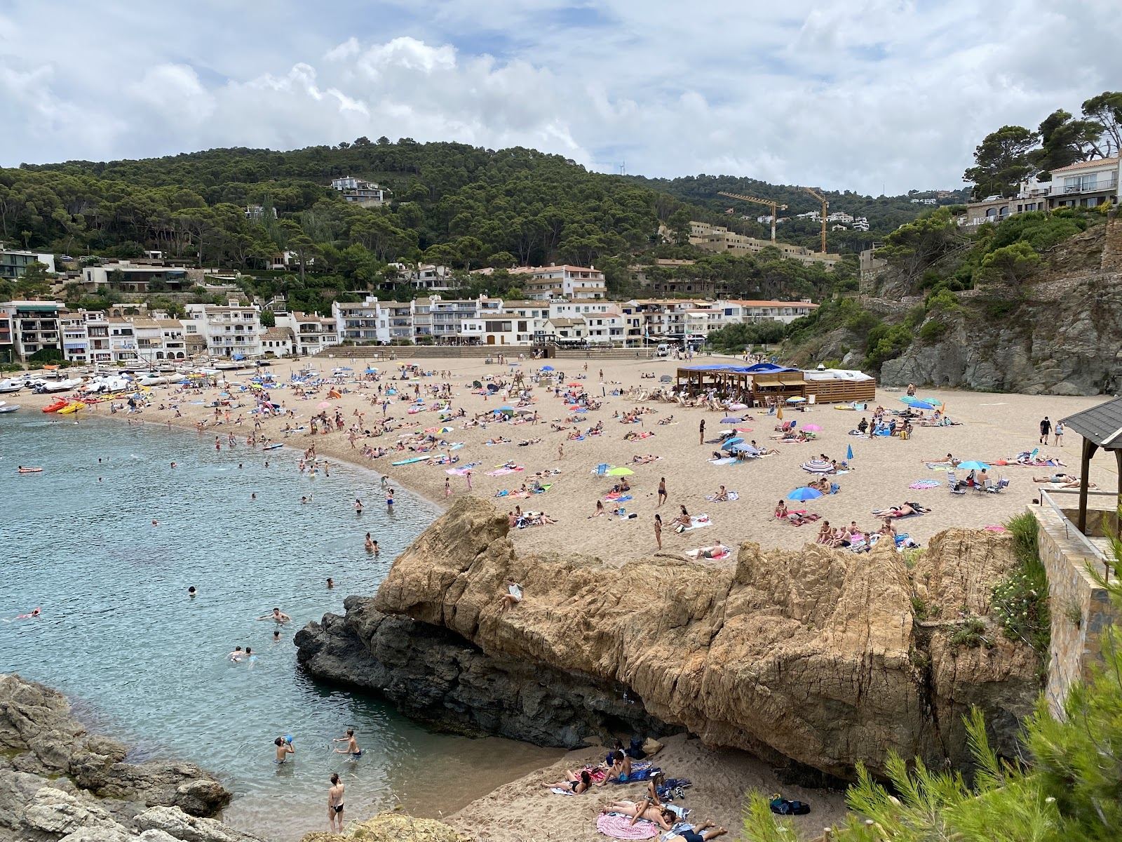 Coarse golden sand of Sa Riera, the largest beach in Begur on the Costa Brava