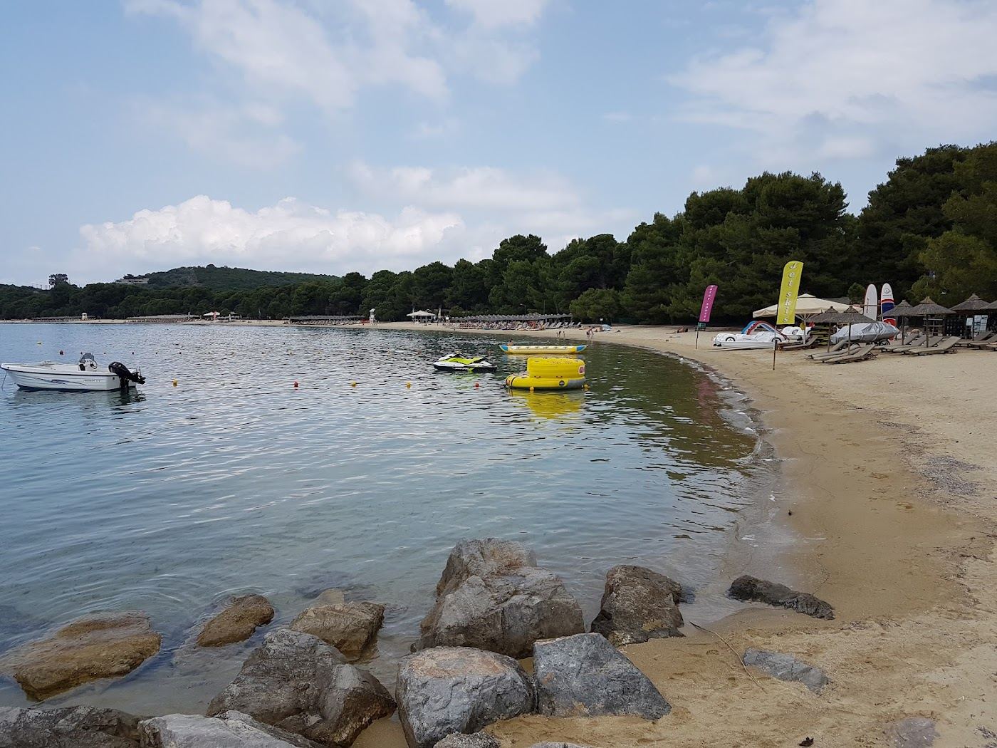 Daybeds and sunbeds at a beach club in Skiathos