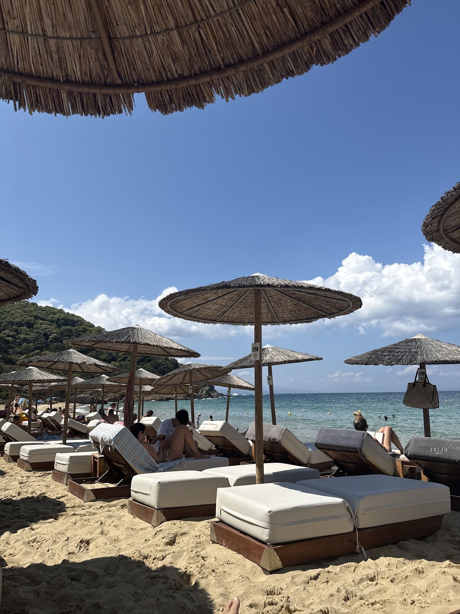 Golden sand and clear water at Banana Beach near Koukounaries on Skiathos in Greece
