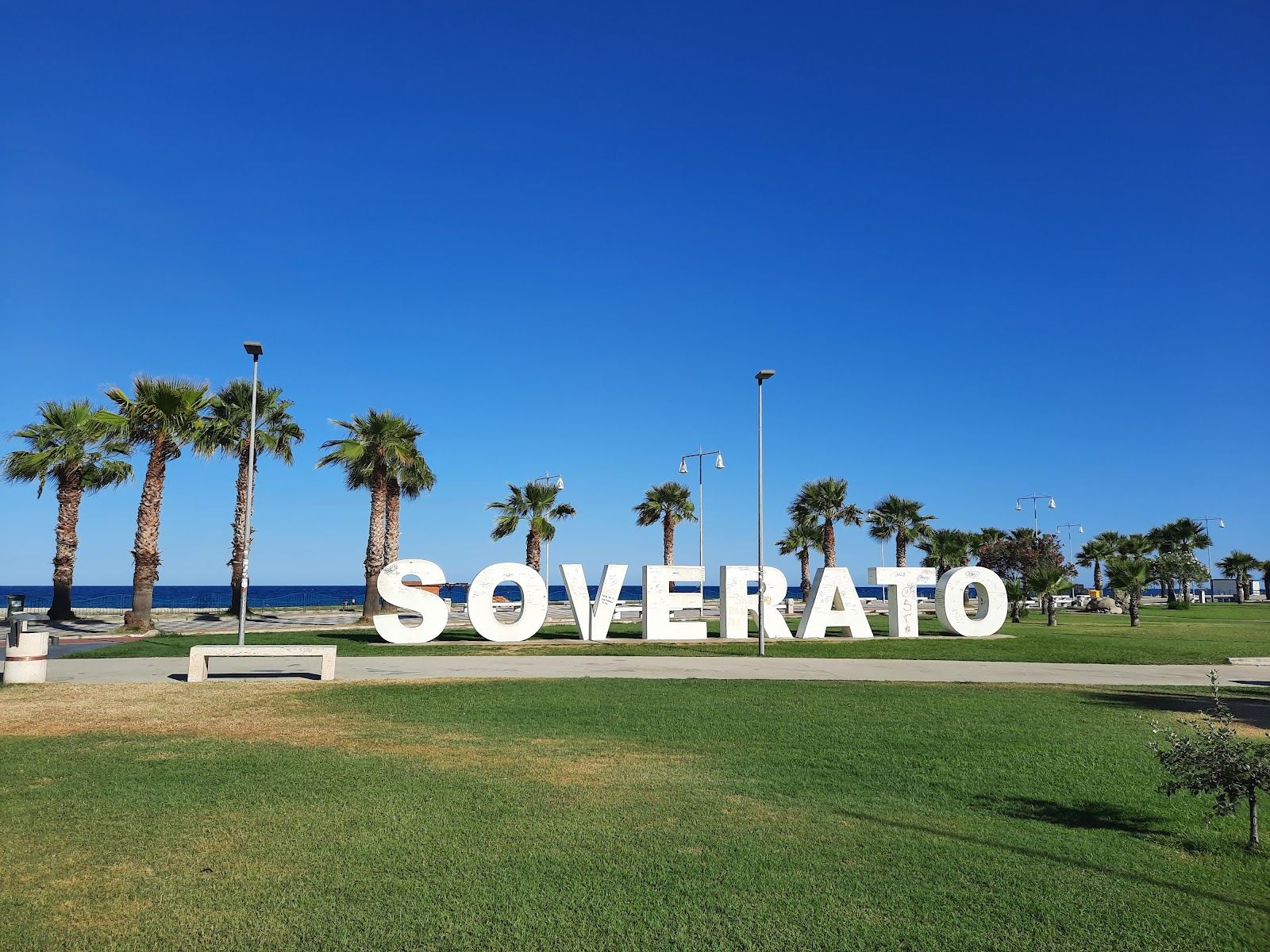 Golden sand and clear water along the resort beach at Soverato on the Ionian coast of Calabria