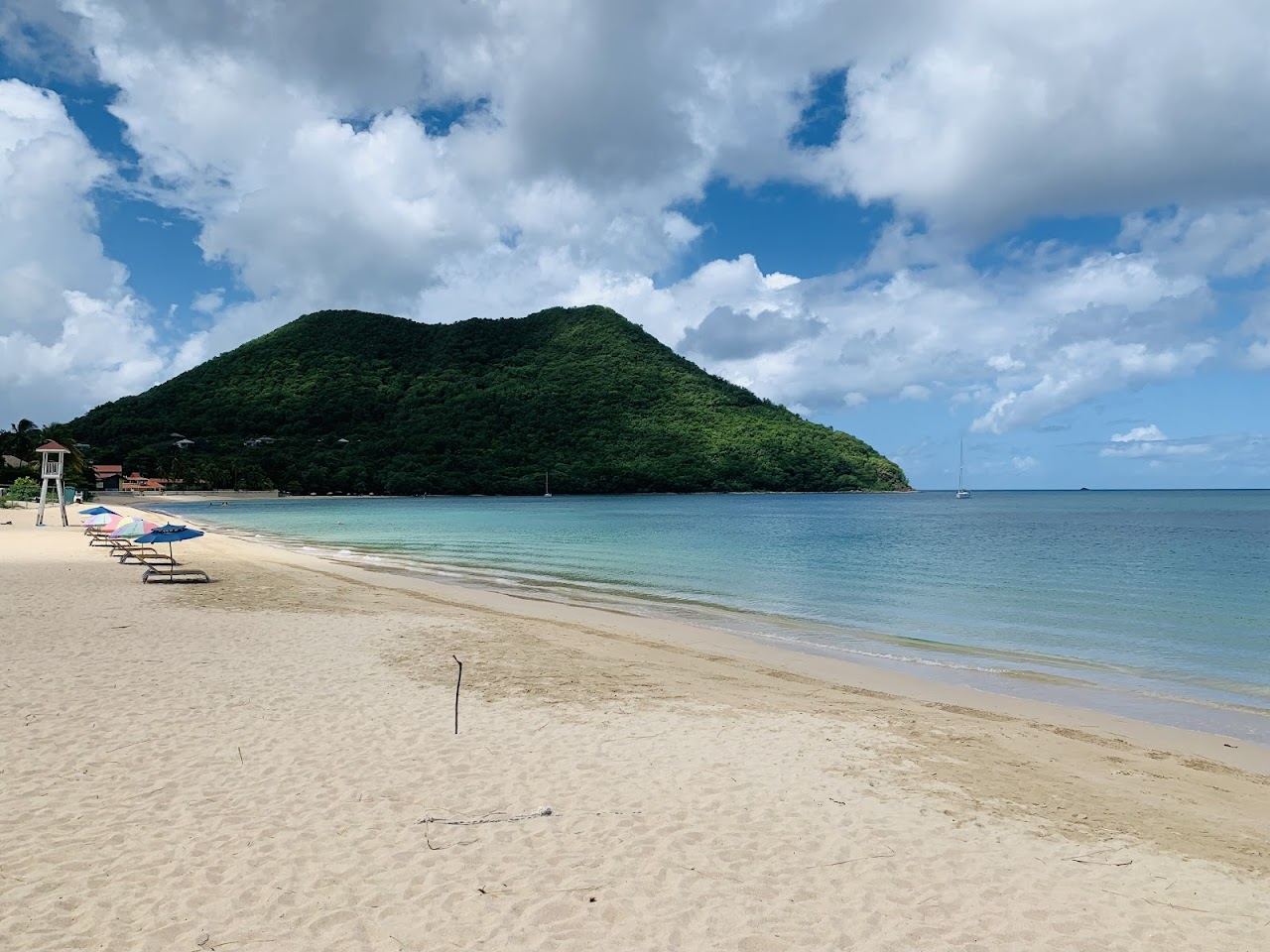 Golden sand and calm turquoise water at Reduit Beach in Rodney Bay on the north coast of St Lucia
