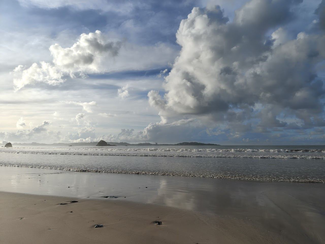 The long sandy learner surf bay at Weligama on the south coast of Sri Lanka