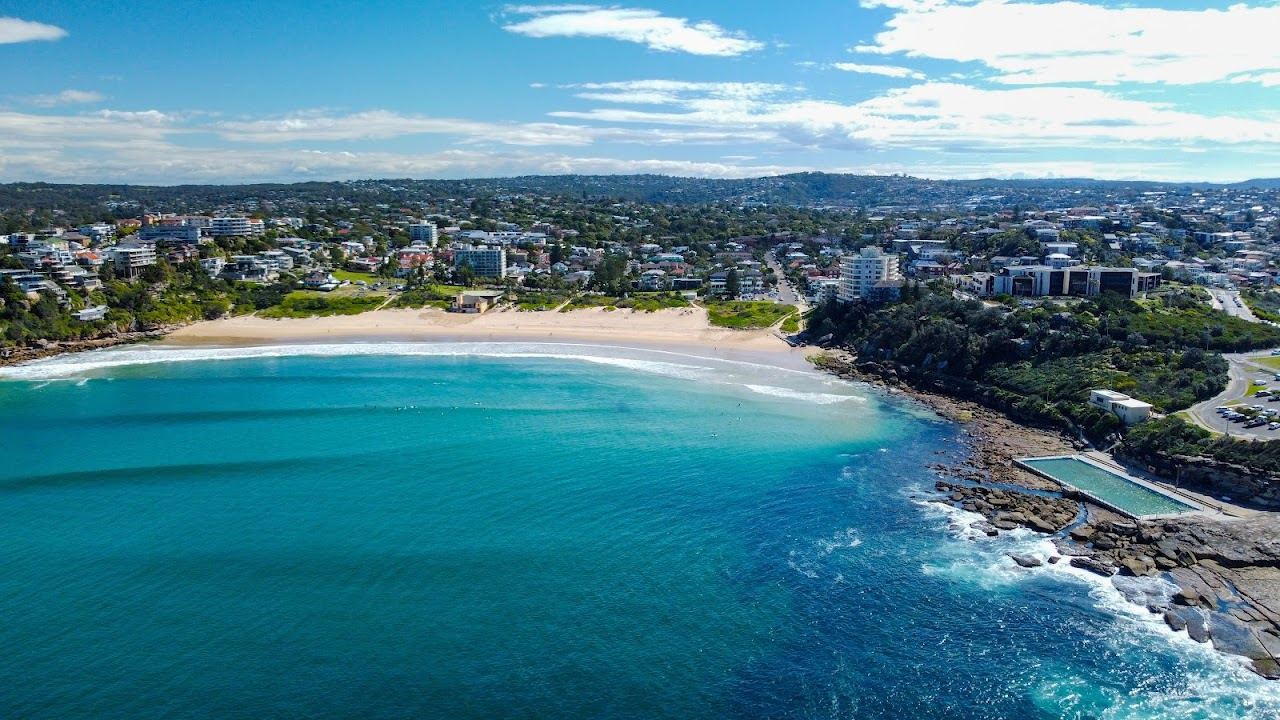 The headland and beach break at Freshwater Beach in northern Sydney