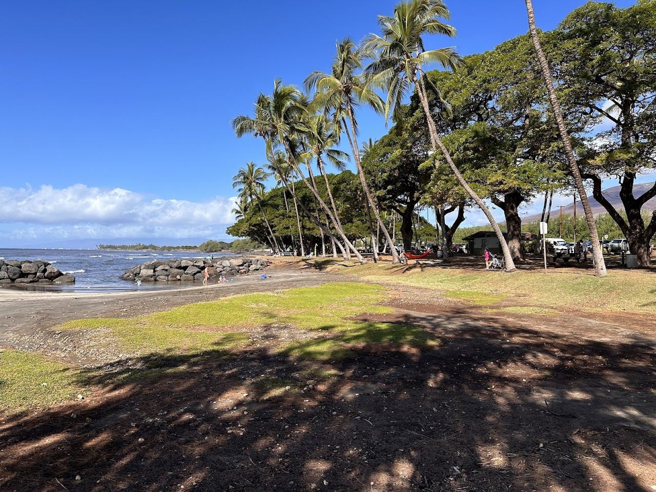 The gentle point and mountain backdrop at Launiupoko Beach Park on West Maui
