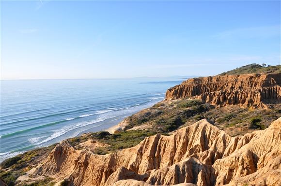Torrey Pines State Beach San Diego wide sand below sandstone cliffs