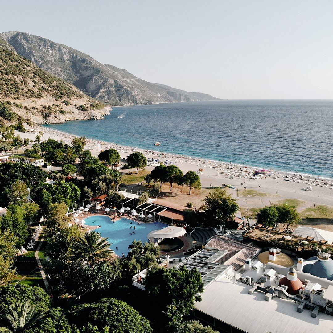 The lively main beach below the town at Belcekiz in Oludeniz